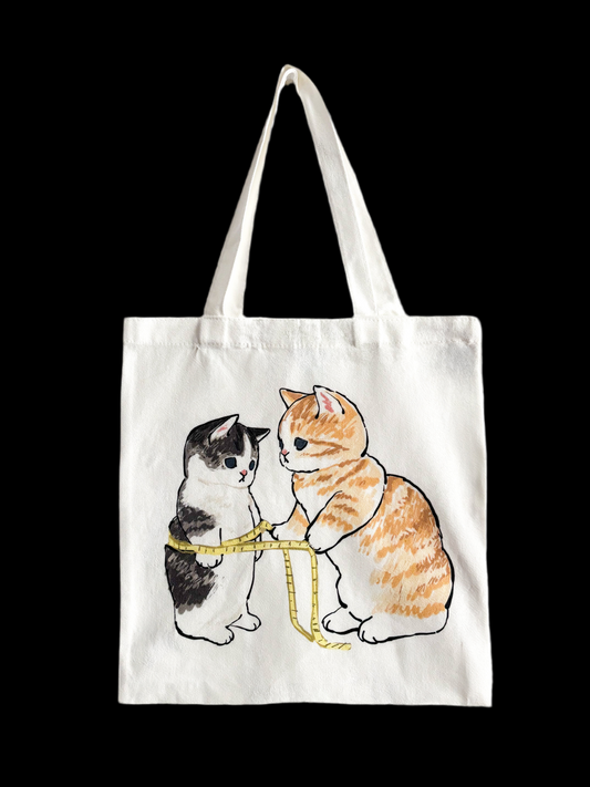 Cute Cat bags two cats measuring each other
